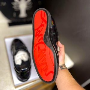 Authentic Christian Louboutin size 13 9/10 condition.